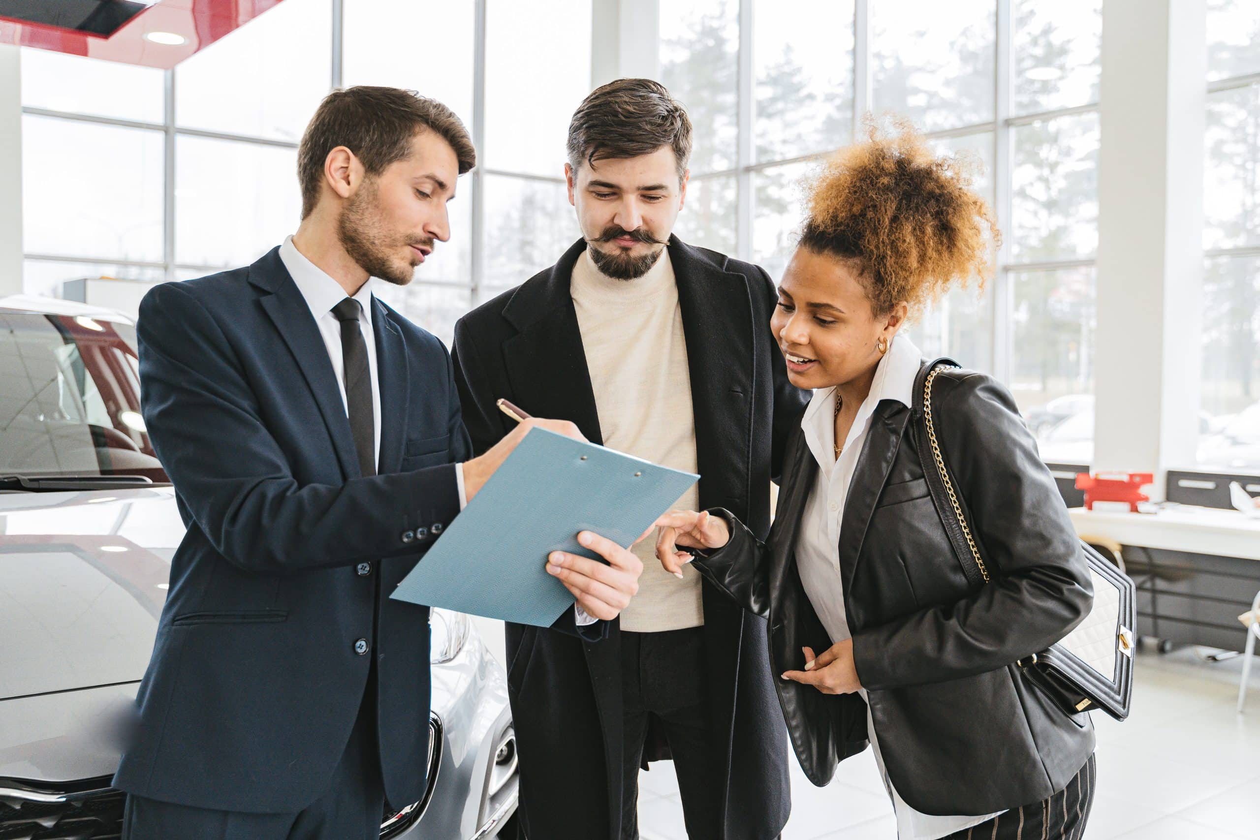 People In Car Dealership