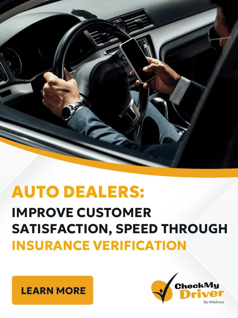 man on steering wheel using his phone