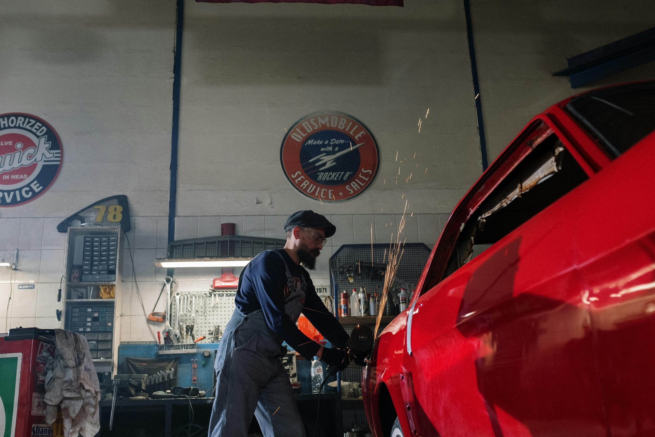 Mechanic working on a car in a service department